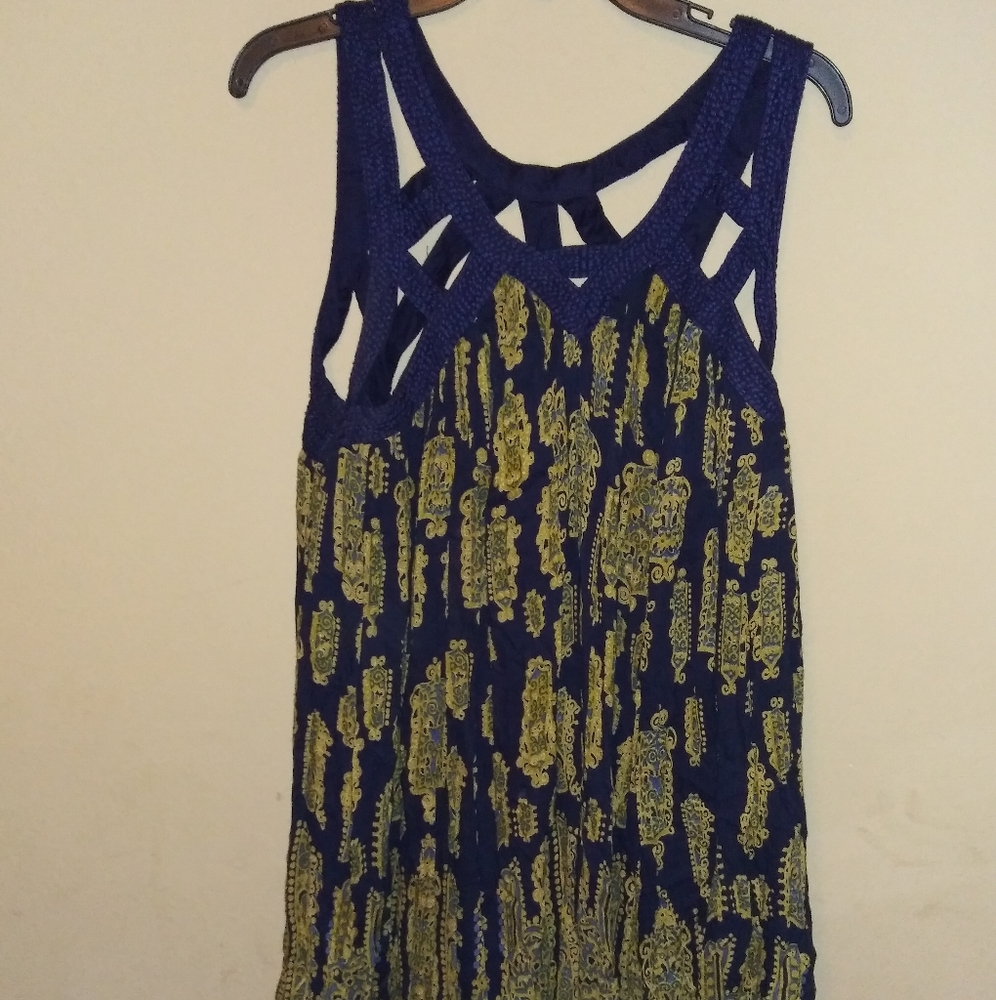 Sleeveless blue and gold camisole.